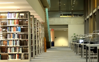 bookshelves and desks in the Bronfman Business Library